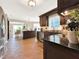 Open concept kitchen with stainless steel appliances at 102 Via Duomo, New Smyrna Beach, FL 32169
