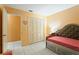 Bedroom with daybed and large closet, freshly painted walls at 636 Koala Ct, Poinciana, FL 34759