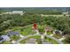 Aerial view of house and surrounding neighborhood at 636 Koala Ct, Poinciana, FL 34759