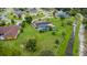 Aerial view showing house, pool and large lot at 636 Koala Ct, Poinciana, FL 34759