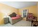 Charming bedroom with a daybed and built-in storage at 636 Koala Ct, Poinciana, FL 34759