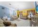 Spacious living room with tile floors, featuring ample natural light at 636 Koala Ct, Poinciana, FL 34759
