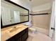 Clean bathroom with tub, toilet, and vanity at 4100 Dijon Dr # 4100E, Orlando, FL 32808