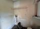 Laundry area with shelving and hookups for washer and dryer at 4100 Dijon Dr # 4100E, Orlando, FL 32808