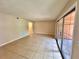 Open living area showcasing tile floors and a view of the hallway at 4100 Dijon Dr # 4100E, Orlando, FL 32808