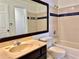 Clean bathroom with tub, toilet, and vanity at 4100 Dijon Dr # 4100E, Orlando, FL 32808