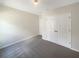 Bedroom with double-door closet and carpet at 920 Benjamin Trl, Davenport, FL 33837