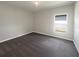 Well-lit bedroom featuring carpet and window at 920 Benjamin Trl, Davenport, FL 33837