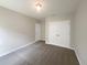 Bedroom with double door closet and neutral walls at 920 Benjamin Trl, Davenport, FL 33837