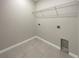 Laundry room with shelving and tile floor at 920 Benjamin Trl, Davenport, FL 33837