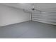Attached garage with open garage door at 920 Benjamin Trl, Davenport, FL 33837
