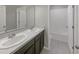 Bathroom with a double vanity and a bathtub at 920 Benjamin Trl, Davenport, FL 33837