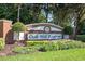 Community entrance with brick pillars and landscaping at 1301 Kintla Rd, Apopka, FL 32712