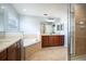 Bathroom with double vanity, soaking tub, and shower at 1301 Kintla Rd, Apopka, FL 32712