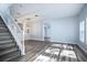 Spacious dining area with hardwood floors and modern light fixture at 1301 Kintla Rd, Apopka, FL 32712