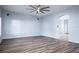 Open Gathering room with hardwood floors and ceiling fan at 1301 Kintla Rd, Apopka, FL 32712