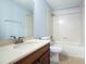 Clean bathroom with tub, toilet, and vanity at 1301 Kintla Rd, Apopka, FL 32712