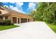 Three-car garage with ample parking space at 2083 Biltmore Pt, Longwood, FL 32779