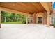 Covered entryway with wooden ceiling and brick columns at 2083 Biltmore Pt, Longwood, FL 32779