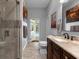 Bathroom with shower and view of the pool at 2083 Biltmore Pt, Longwood, FL 32779