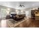 Main bedroom with sitting area and hardwood floors at 2083 Biltmore Pt, Longwood, FL 32779