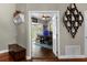 Home entryway with access to an office with hardwood floors at 2083 Biltmore Pt, Longwood, FL 32779