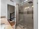 Spa-like bathroom with walk-in shower and view of staircase at 2083 Biltmore Pt, Longwood, FL 32779