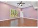 Bedroom with hardwood floors and large window at 2083 Biltmore Pt, Longwood, FL 32779