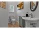 Clean bathroom with pedestal sink and toilet at 2083 Biltmore Pt, Longwood, FL 32779