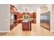 Eat-in kitchen with stainless steel appliances and an island at 2083 Biltmore Pt, Longwood, FL 32779