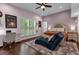 Bright bedroom with queen bed and home office area at 2083 Biltmore Pt, Longwood, FL 32779