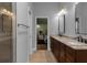 Elegant bathroom with double vanity and shower at 2083 Biltmore Pt, Longwood, FL 32779