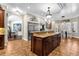 Open kitchen with large island and breakfast nook area at 2083 Biltmore Pt, Longwood, FL 32779