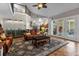 Open living room with access to pool area and comfortable seating at 2083 Biltmore Pt, Longwood, FL 32779