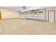 Spacious two-car garage with ample storage space and epoxy flooring at 2083 Biltmore Pt, Longwood, FL 32779
