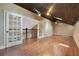 Bright bonus room featuring wood floors and a vaulted ceiling at 2083 Biltmore Pt, Longwood, FL 32779