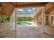 Expansive pool and patio area with covered seating at 2083 Biltmore Pt, Longwood, FL 32779