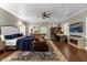 Spacious main bedroom with sitting area, fireplace, and large windows at 2083 Biltmore Pt, Longwood, FL 32779