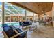 Relaxing poolside patio with seating and games at 2083 Biltmore Pt, Longwood, FL 32779