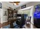 Spacious home office with large desk and comfortable seating at 2083 Biltmore Pt, Longwood, FL 32779