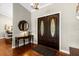 Elegant entryway with double doors and hardwood floors at 2083 Biltmore Pt, Longwood, FL 32779