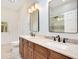 Bathroom with double vanity and walk in shower at 2083 Biltmore Pt, Longwood, FL 32779
