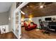 Upstairs bonus room features a workspace, sleeping area, and wood ceiling at 2083 Biltmore Pt, Longwood, FL 32779