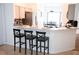 Kitchen boasts a breakfast bar with seating for three at 605 Oakpoint Cir, Davenport, FL 33837