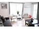 Bright living room with comfortable seating and plenty of natural light at 605 Oakpoint Cir, Davenport, FL 33837