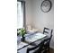 Dining area with black table and chairs, stylish decor at 605 Oakpoint Cir, Davenport, FL 33837