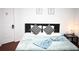 Inviting bedroom with a queen bed and decorative pillows at 605 Oakpoint Cir, Davenport, FL 33837