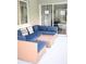 Relaxing patio with sectional wicker furniture at 605 Oakpoint Cir, Davenport, FL 33837