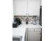 Well-equipped kitchen corner with ample counter space at 605 Oakpoint Cir, Davenport, FL 33837