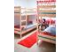 Bedroom with twin-over-twin bunk beds and Mickey Mouse theme at 605 Oakpoint Cir, Davenport, FL 33837